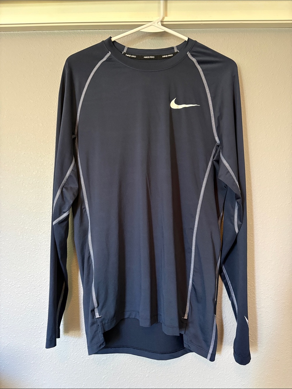 Nike Black Long Sleeve Performance Top with White Swoosh